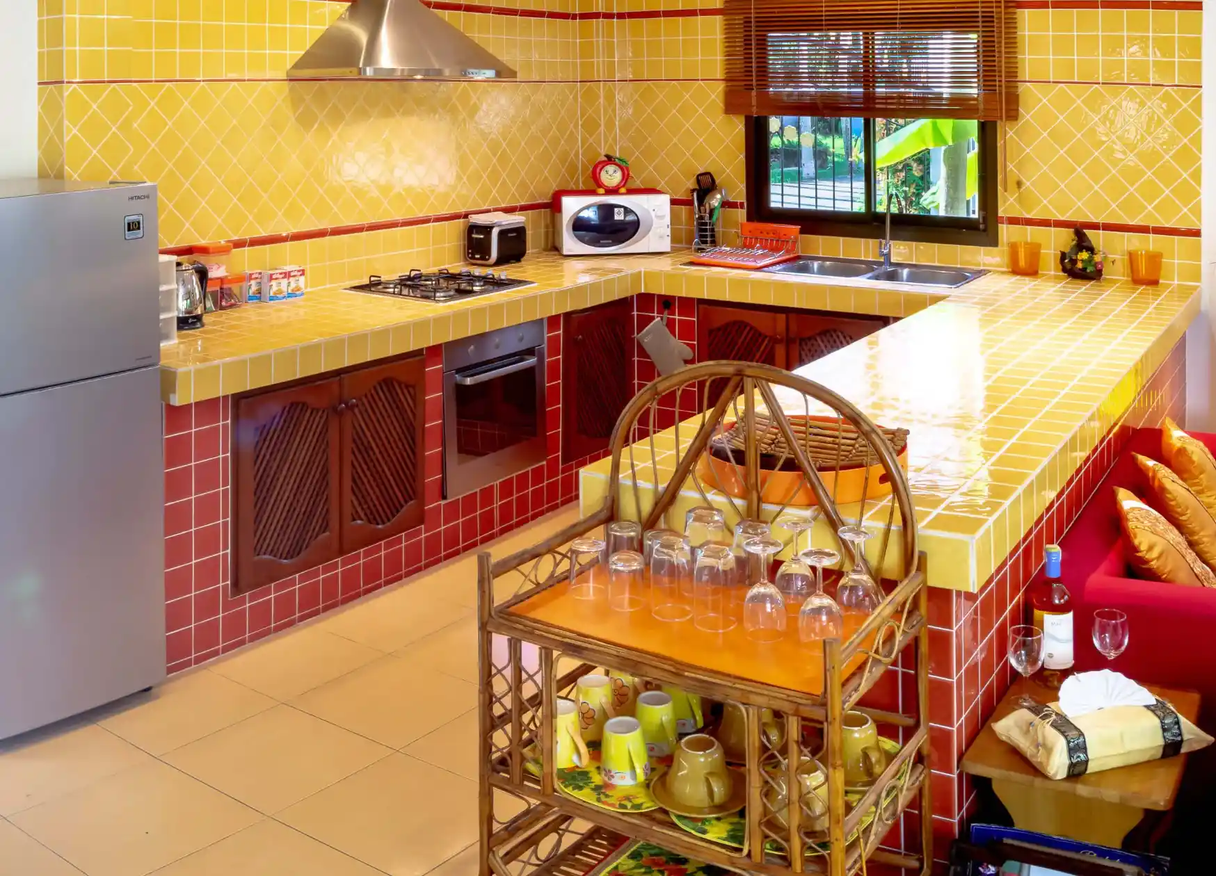 Bon Island Villa kitchen with large refrigerator, hob and cooking appliances