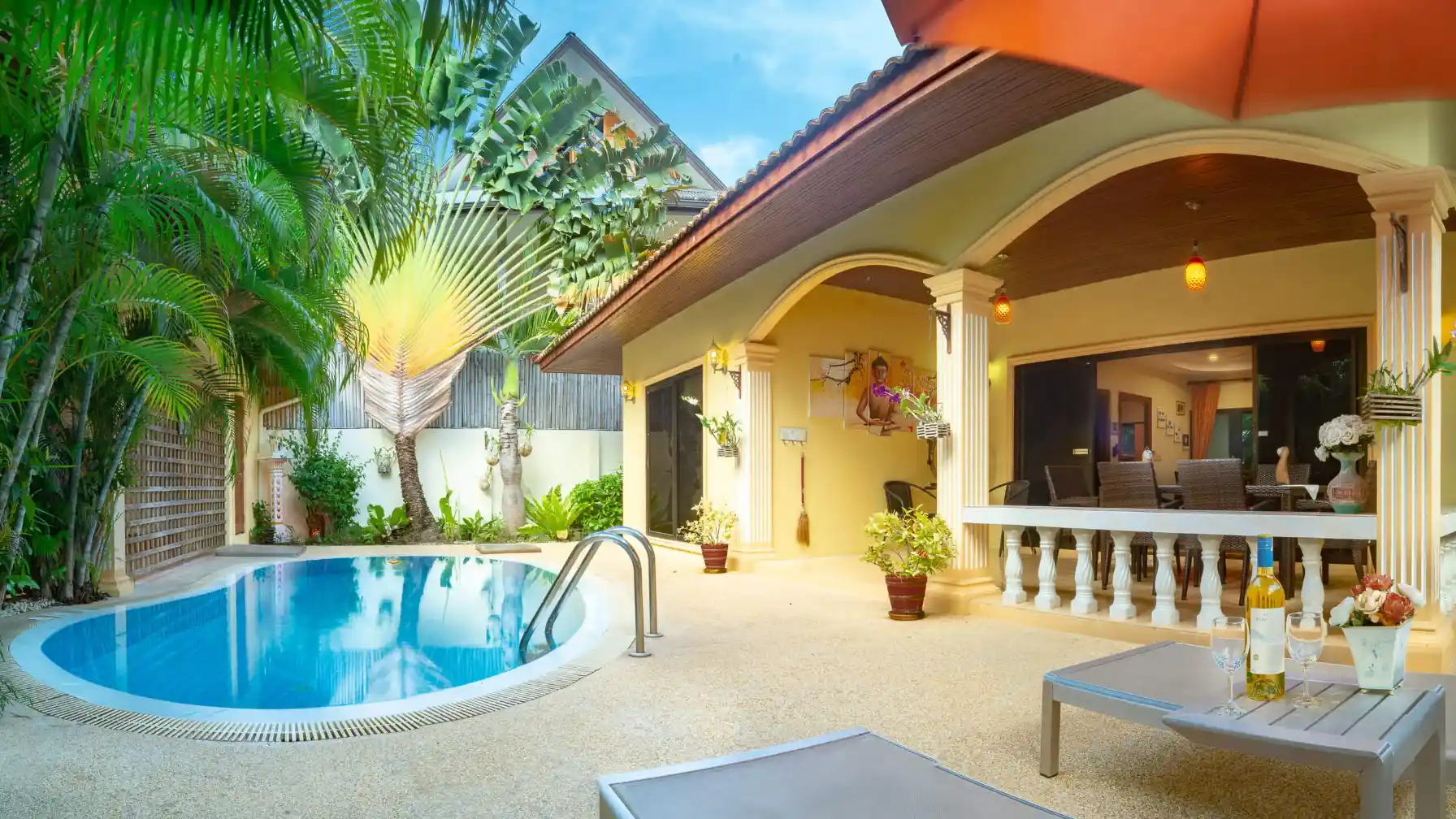 Bon Island Villa private pool with tropical garden and coconut palms