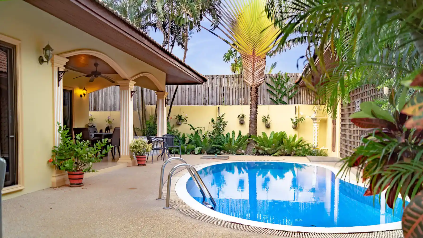Coral Island Villa private pool with tropical garden and covered patio, Rawai Phuket